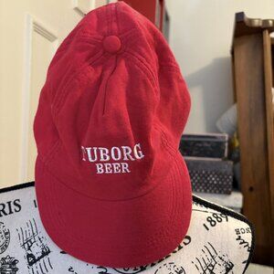 ITEM NO. 39: Red Tuborg Beer baseball cap. Fully adjustable. Unisex.